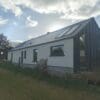 Shanette Steel Frame house extension with Standing Seam Gable end.