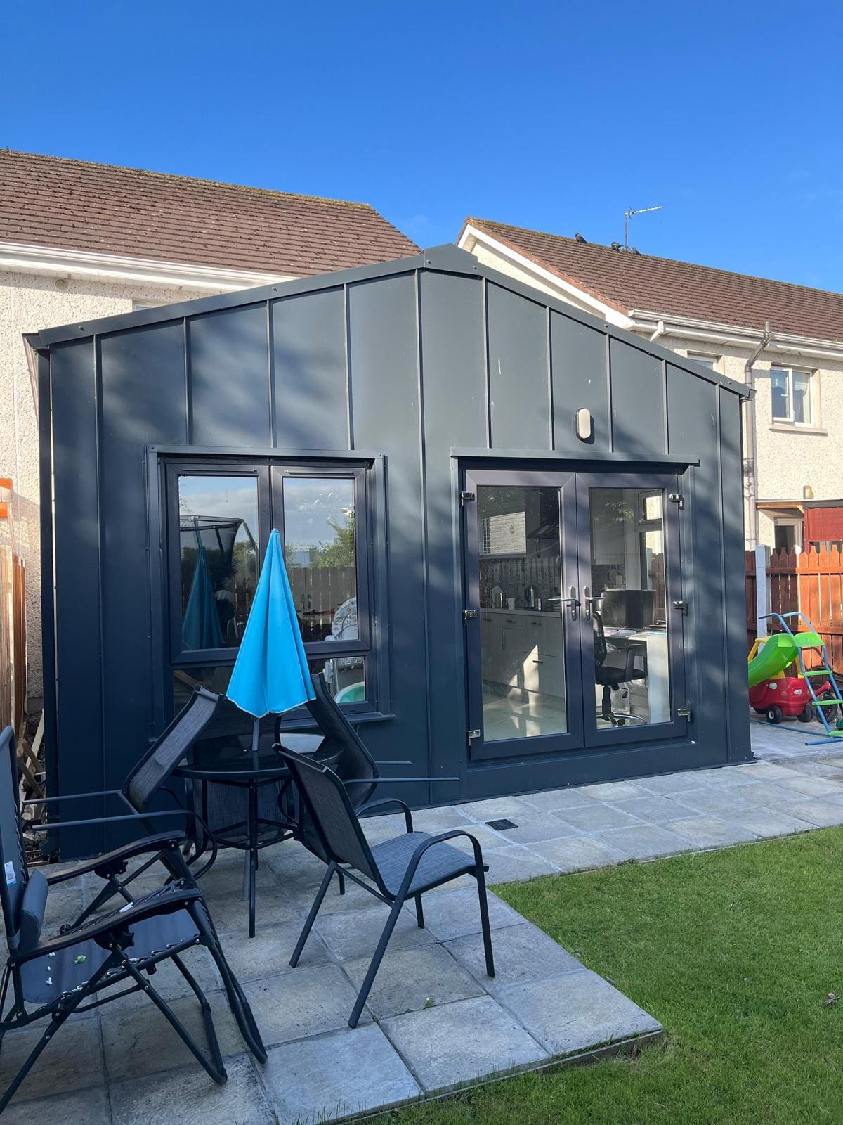 Steel Frame House Extension with Standing Seam Cladding